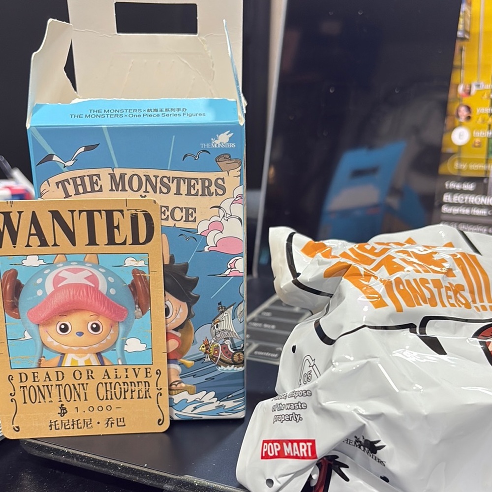 The monsters one piece open box but sealed bag